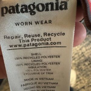 Patagonia Women's Jacket Label with Blue and Purple Accent